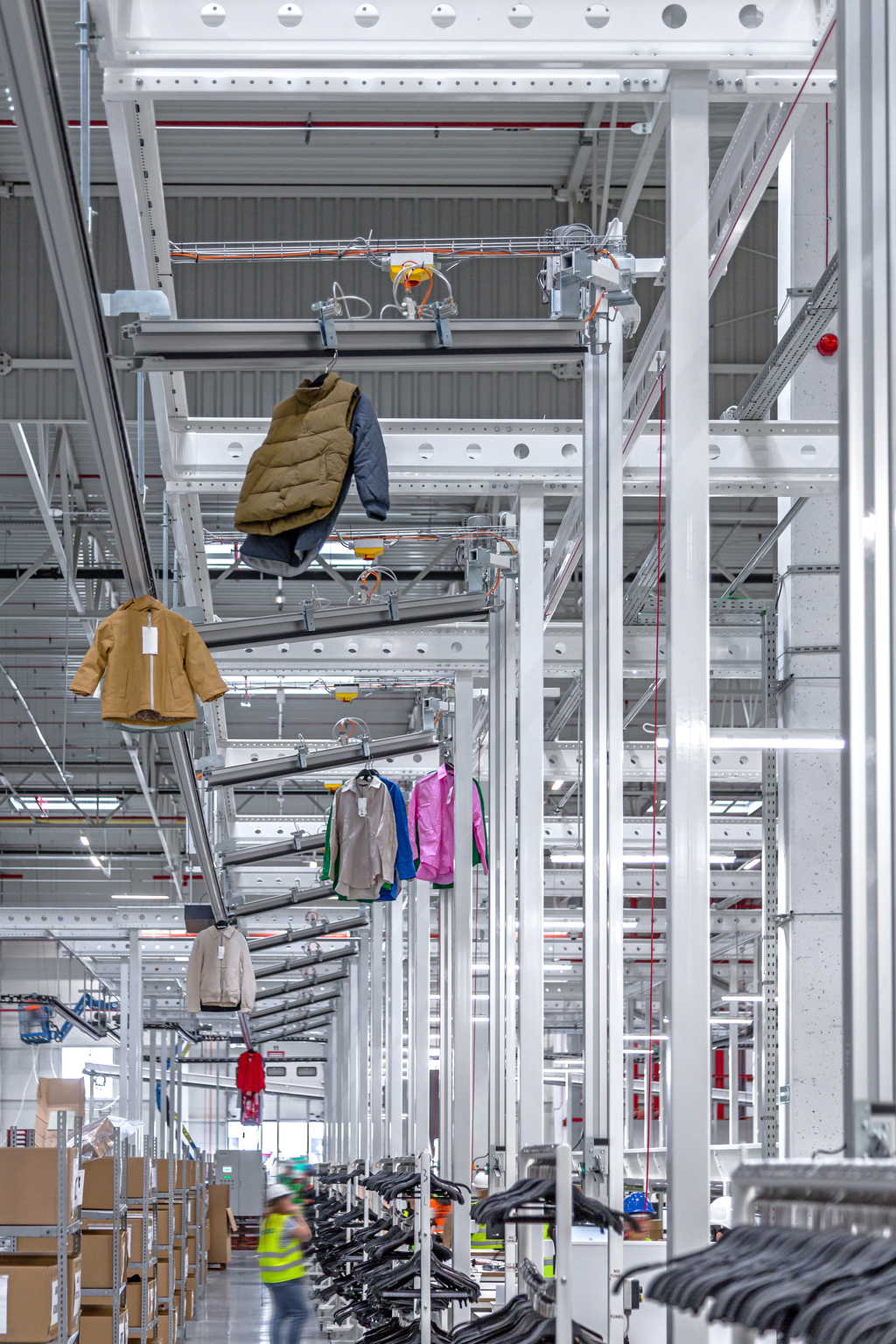  create and image text and alternative image text to enhance website accessability and its ability to perform outstandingly in search engine searches: Garment Clip Conveoyrs deliver garments on hangers to bagging machines.  Here’s a well-optimized image alt text and image title text for accessibility and SEO, based on your description:  🔹 Image Title Text (visible as tooltip on hover): "Garment Clip Conveyors Transporting Hanging Garments to Automated Bagging Machines"  🔹 Alternative (Alt) Text (used by screen readers and search engines): "Automated garment clip conveyor system moving clothes on hangers toward an industrial bagging machine in a dry cleaning or laundry facility."  These descriptions improve accessibility for screen readers and enhance your SEO by including relevant keywords like:  Garment clip conveyor  Automated system  Garments on hangers  Bagging machine  Dry cleaning / laundry facility  Let me know if the image shows a specific brand, layout, or process detail — I can tailor the text further.   Build a little bit more text aroundd this Our experience of more than 40 years guarantees that we will find the best solution for each requirement. also that we have projects in more than 40 countries  Sure! Here's a refined and slightly expanded version of the text, emphasizing trust, global experience, and tailored solutions — perfect for a website section or product page:  With over 40 years of experience in the industry, we bring unmatched expertise to every project. Our team has delivered efficient garment handling solutions in more than 40 countries around the world. Whether it’s a compact setup for a local facility or a fully automated system for large-scale operations, we tailor each solution to meet your specific requirements. You can rely on our global insight and decades of hands-on experience to design systems that truly work — efficiently, reliably, and with precision.  Let me know if this should be written in a more technical, sales-driven, or minimalist tone — or if you’d like a version in Finnish too.   Salpomec garment conveyors have well tested durability, speed and adaptability to meet our client’s needs ranging from industrial laundry sorting systems, apparel logistics providers, distribution centers and reverse logistics in fashion. Our experience of more than 30 years guarantees that we will find the best solution for each requirement.  Our garment conveyors are mainly moving the garments either with pin conveyors or clip conveyors. They deliver or sort the garments on hangers (GOH) to their desired destination. Our conveyors function overhead and can be supported from the warehouse or building structure or from a separate sigma structure. The conveyors can lift the garments to multilevel mezzanine at angles or vertically with garment conveyor lifts.  Benefits of the Salpomec Garment conveyors Adaptability to various picking and sortation needs of garments   Durable and well tested design   Compatible with most hanger types   Full range connections to steam tunnels and bagging machines   Clear and spacious feeling to the warehouse   Identification with QR, barcode, RFID, etc.   The ever-increasing need for automated garment handling systems In recent years, we have learned through our tight co-operations with ecommerce, omni-channel warehouse and distribution center providers that they are facing even greater demands to fulfil reverse logistics of online returns in fashion. The volumes and variability of the clothing returns, the seasonal fashion trends changes, preloved clothes and service speed for customer satisfaction are in dire need of garment handling systems. They need to be highly adaptable for different methods of handling and in streamlining the process.  When garments are hanging from coat hangers, the building of systems for their storage, picking and sorting is our specialty.  And it has been so – for over 30 years with experience in 44 countries. Salpomec hanging garment systems provide customers the accuracy, speed, well tested durability and adaptable state of the art products, such as clip conveyors, pin conveyors, pocket sorters, hanging garment racking systems and integrations to finishing and bagging machines.   Starting in 5.2022 (ending in 12.2023) we conduct a project named “Internationalization of the new conveyor system” which is co-funded by the EU.  The purpose of the project is to internationalize our new conveyor system and further improve the system. In the project, we explore the market opportunities of potential export countries from the perspective of our new conveyor system product. The project strongly supports the growth of Finnish exports and the development of Finland’s international growth and competitiveness.   ----- This is from our old website, write something related to conveyors small text as equal size to the 40 years of experience  Absolutely — here’s a short, focused paragraph that matches the tone and size of the “40 years of experience” paragraph, but focuses on the conveyor systems themselves. It can be used as a standalone statement or paired right after the experience paragraph for balance:  Our conveyor systems are engineered for seamless garment flow, adaptability, and long-term reliability. Whether for industrial laundry, fashion logistics, or reverse logistics of e-commerce returns, our conveyors ensure efficient movement, accurate sorting, and compatibility with a wide range of garment handling needs. Designed for overhead use, they maximize floor space and support growth in both traditional and high-demand, fast-moving environments.  Let me know if you want a more technical version or if you'd like a Finnish version as well.   More examples and themes  Here are 5 alternative small text blocks (same length and style as the "40 years of experience" one) with different angles or themes related to your garment conveyor systems. You can rotate these across the site or use them in different sections (e.g. About, Solutions, Product Details, EU Project, etc.):  1. Proven Performance in Demanding Environments Our garment conveyors are in daily use across high-volume laundries, e-commerce hubs, and retail distribution centers — operating with the reliability, speed and precision that modern logistics demands.  2. Built for Scalability and Growth From small-scale setups to fully automated multi-level systems, our conveyors grow with your operations. The modular design ensures future expansions and integrations are simple and cost-effective.  3. Designed for Modern Fashion Logistics With the rise of online returns, preloved fashion, and fast fulfillment cycles, our conveyor systems are tailored to handle the complexity of modern apparel logistics with ease.  4. Smart Integration for Smarter Warehouses Our systems integrate seamlessly with scanning, identification, bagging and finishing systems. Whether using RFID, QR or barcode — your garments are always traceable and in the right place.  5. EU-Funded Innovation in Motion Our newest conveyor system has been developed with support from the EU to meet the needs of international markets. It reflects our ongoing commitment to innovation and sustainable export growth.  Let me know if you'd like a version tailored to a specific use case (e.g., reverse logistics, steam tunnel integration, fashion warehouses), or if you want a Finnish version of any of these.   now we need new names for garment conveyor system pictures to better the pages SEO, and the alt text. First picture tuckecedos, on a garment convyer system   Good — this is exactly the kind of small SEO detail that actually moves rankings over time.  Let’s optimize this properly: file name + alt text + title text, all aligned with your keywords (garment conveyor, GOH, apparel logistics, etc.).  🔹 Image 1: Tuxedos on a garment conveyor system ✅ SEO File Name garment-conveyor-system-tuxedos-on-hangers-apparel-logistics.jpg  (Alternative variations you can rotate if needed)  garment-conveyor-tuxedos-goh-system.jpg  overhead-garment-conveyor-tuxedos-logistics.jpg  ✅ Alt Text (primary SEO + accessibility) "Tuxedos on hangers moving through an overhead garment conveyor system in an apparel logistics warehouse."  ✅ Title Text (tooltip) "Garment Conveyor System Transporting Tuxedos on Hangers"  🔹 Why this works (quick logic) Includes main keyword: garment conveyor system  Includes context keywords: tuxedos, hangers, apparel logistics  Describes the actual image clearly → good for accessibility  Avoids keyword stuffing (important)  If you want, next we can: 👉 build a full naming system for all your images (super powerful for SEO consistency) 👉 or go image-by-image and optimize the whole page properly (this compounds hard)   lets first make each picture the name and after this lets make the alt text, in bunch to each. Next colourfull clothes hanging in a garment convyors in man levels  Good call — do filenames first, then alt texts in one batch.  🔹 Image 2: Colourful clothes on multi-level garment conveyor ✅ SEO File Name options Pick one main, keep others as variants if needed:  garment-conveyor-multilevel-colorful-clothes-on-hangers.jpg  Alternatives:  multilevel-garment-conveyor-colorful-clothing-goh-system.jpg  overhead-garment-conveyor-multi-level-apparel-flow.jpg  garment-handling-system-multilevel-colorful-garments.jpg  Send the next image 👍   garment-handling-system-multilevel-colorful-garments this  Good — that’s a strong, clean filename 👍  Saved as:  garment-handling-system-multilevel-colorful-garments.jpg  Send the next image name.   next, garment conveyor system delivirign GOH to bagging machines  Good, keep the same structure.  ✅ SEO File Name garment-conveyor-system-delivering-goh-to-bagging-machine.jpg  (If you want a slightly broader variant for SEO spread:)  garment-conveyor-goh-bagging-machine-apparel-logistics.jpg  Send the next 👍   This garment-conveyor-goh-bagging-machine-apparel-logistics  Perfect — that’s a strong one 👍  Saved as:  garment-conveyor-goh-bagging-machine-apparel-logistics.jpg  Send the next.   garment conveyor system with no goh in the picture  Good — let’s name it so it still targets the main keyword even without GOH visible.  ✅ SEO File Name garment-conveyor-system-overhead-warehouse.jpg  Alternatives:  overhead-garment-conveyor-system-empty-line.jpg  garment-conveyor-system-warehouse-installation.jpg  Send the next 👍   this garment-conveyor-system-overhead-warehouse  Good — clean and SEO solid 👍  Saved as:  garment-conveyor-system-overhead-warehouse.jpg  Send the next.   next garments on a line to a loading dock sorted by automated switches  Nice — this is a strong SEO opportunity (sorting + automation + loading dock).  ✅ SEO File Name automated-garment-conveyor-sorting-loading-dock.jpg  Alternatives:  garment-conveyor-automated-sorting-to-loading-dock.jpg  goh-conveyor-automated-switch-sorting-system.jpg  Send the next 👍   automated-garment-conveyor-sorting-loading-dock this  Perfect 👍  Saved as:  automated-garment-conveyor-sorting-loading-dock.jpg  Send the next.   next picture same but from a different angle, showing the switches and a garment conveyor also the loading dog  Good — angle variation, but still keep keyword consistency.  ✅ SEO File Name garment-conveyor-automated-switches-loading-dock.jpg  Alternatives:  automated-garment-conveyor-switches-sorting-loading-dock-angle.jpg  garment-conveyor-switch-system-loading-dock-view.jpg  Send the next 👍   garment-conveyor-automated-switches-loading-dock this  Good — consistent and SEO strong 👍  Saved as:  garment-conveyor-automated-switches-loading-dock.jpg  Send the next.   next and empty garment conveyor and the curve part of it  Good — this one is nice for highlighting system design (curves matter in SEO too).  ✅ SEO File Name garment-conveyor-system-curve-section-empty.jpg  Alternatives:  curved-garment-conveyor-system-overhead.jpg  garment-conveyor-rail-curve-design.jpg  Send the next 👍   curved-garment-conveyor-system-overhead this  Good — clean and slightly more design-focused 👍  Saved as:  curved-garment-conveyor-system-overhead.jpg  Send the next.   Three straight garment conveyors in one of them garmtnets  Good — clear structure, let’s keep it consistent.  ✅ SEO File Name three-garment-conveyors-one-with-garments.jpg  Alternatives:  parallel-garment-conveyor-lines-one-loaded.jpg  multiple-garment-conveyors-partially-loaded-system.jpg  Send the next 👍   parallel-garment-conveyor-lines-one-loaded this  Good — consistent and descriptive 👍  Saved as:  parallel-garment-conveyor-lines-one-loaded.jpg  That’s a solid batch already.  Next step (this is where it really compounds): 👉 I’ll create all alt texts in one optimized set so they:  support SEO without keyword stuffing  are accessibility compliant  reinforce your main keywords across the page  Say “go alt texts” when ready 👍   thats it, now for each and alt text  Perfect — this is where it all comes together. I’ll keep these natural, descriptive, SEO-aligned, and not repetitive (important).  🔹 Alt Texts for All Images 1. garment-conveyor-system-tuxedos-on-hangers-apparel-logistics.jpg Alt text: Tuxedos on hangers moving through an overhead garment conveyor system in an apparel logistics environment.  2. garment-handling-system-multilevel-colorful-garments.jpg Alt text: Colorful garments on hangers transported across a multi-level garment handling conveyor system in a warehouse.  3. garment-conveyor-goh-bagging-machine-apparel-logistics.jpg Alt text: Garment conveyor system delivering garments on hangers (GOH) to an automated bagging machine in a logistics facility.  4. garment-conveyor-system-overhead-warehouse.jpg Alt text: Empty overhead garment conveyor system installed in a warehouse, showing rail structure and layout.  5. automated-garment-conveyor-sorting-loading-dock.jpg Alt text: Automated garment conveyor system sorting hanging garments toward a loading dock using switch-based routing.  6. garment-conveyor-automated-switches-loading-dock.jpg Alt text: Detail of garment conveyor system with automated switches directing garments to a loading dock area.  7. curved-garment-conveyor-system-overhead.jpg Alt text: Curved section of an overhead garment conveyor system showing rail design and directional flow.  8. parallel-garment-conveyor-lines-one-loaded.jpg Alt text: Parallel garment conveyor lines in a warehouse, with one line carrying garments on hangers and others empty.  🔹 Quick note (important for SEO) You’ve now done this right:  Filenames = keyword targeted  Alt texts = natural + descriptive  Variations = avoids over-optimization penalty  👉 This is exactly how you build topical authority for “garment conveyor system”  If you want next level: 👉 we can align these with on-page text + headings + internal links → that’s where rankings really move.   one more name and the alt text to it, row of vertical garment lifts lifting up garments and a garmetn conveyors part of the system  Good — strong visual, and important keyword opportunity (lifts + system integration).  ✅ SEO File Name vertical-garment-lifts-with-conveyor-system.jpg  Alternative:  garment-conveyor-system-with-vertical-lifts.jpg  ✅ Alt Text Row of vertical garment lifts raising garments on hangers, integrated with an overhead garment conveyor system in a warehouse.